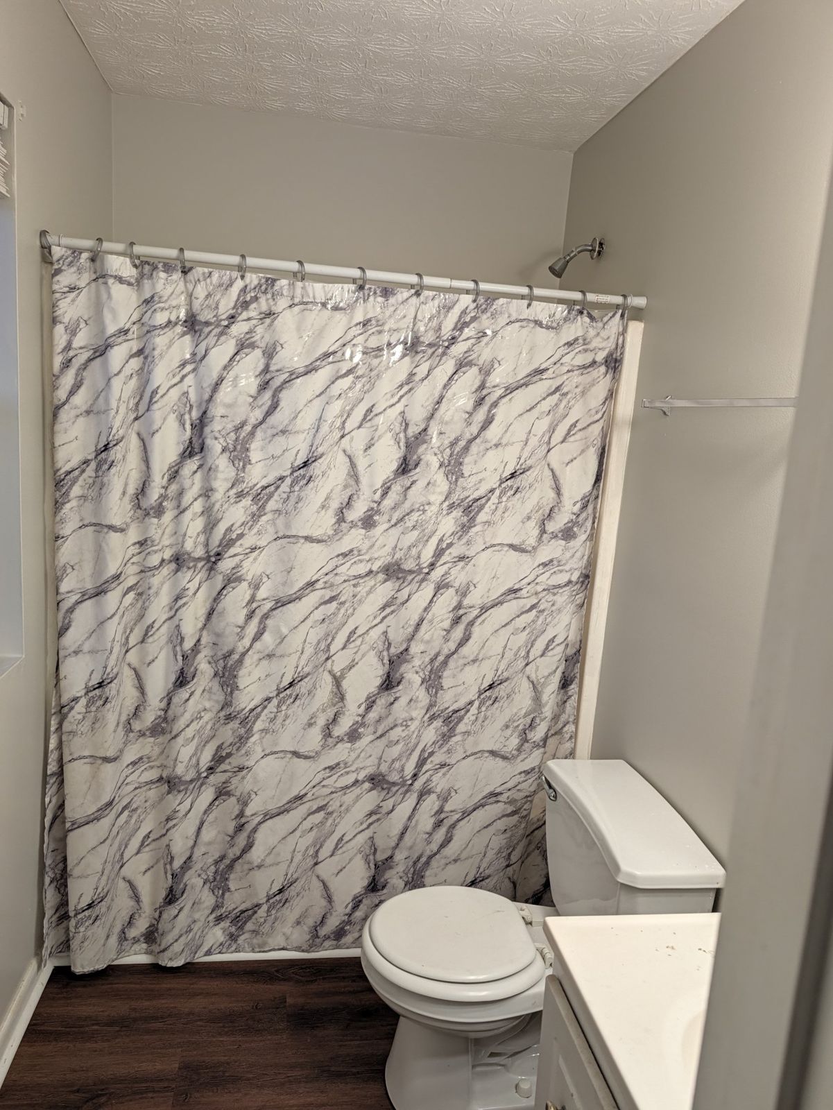Bathroom with tub and shower