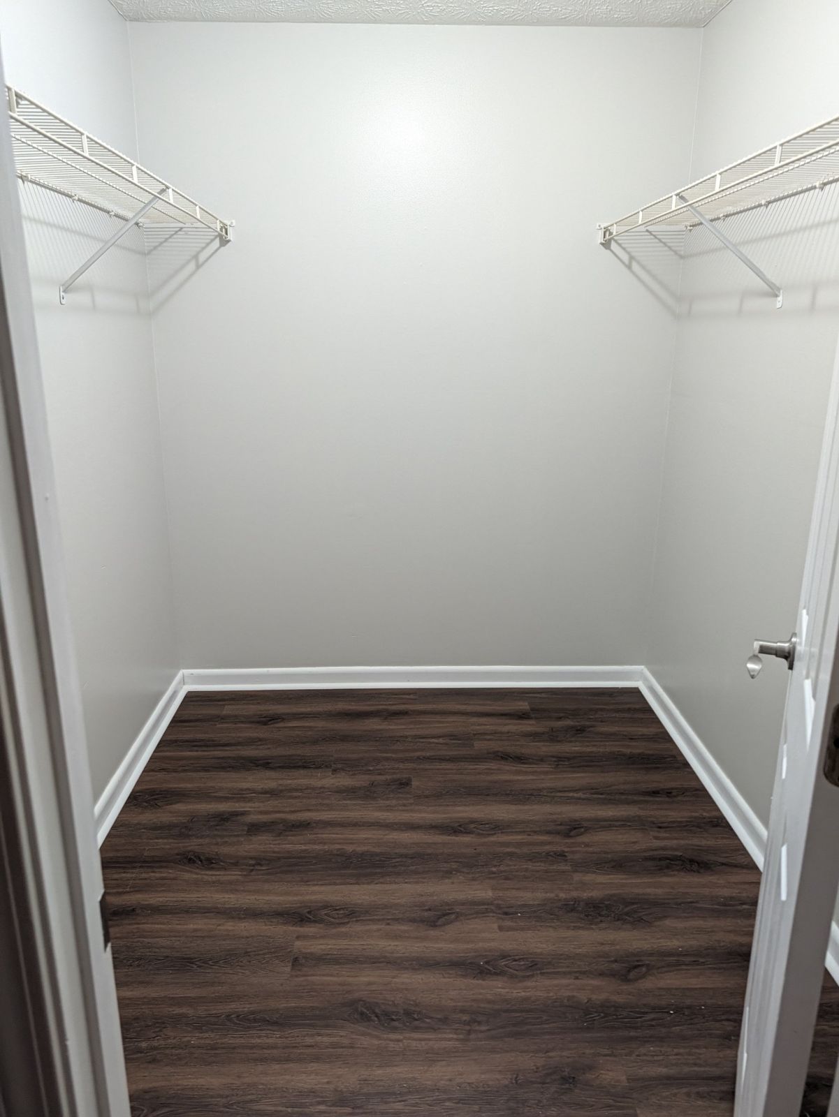 Walk-in closet with wire shelving